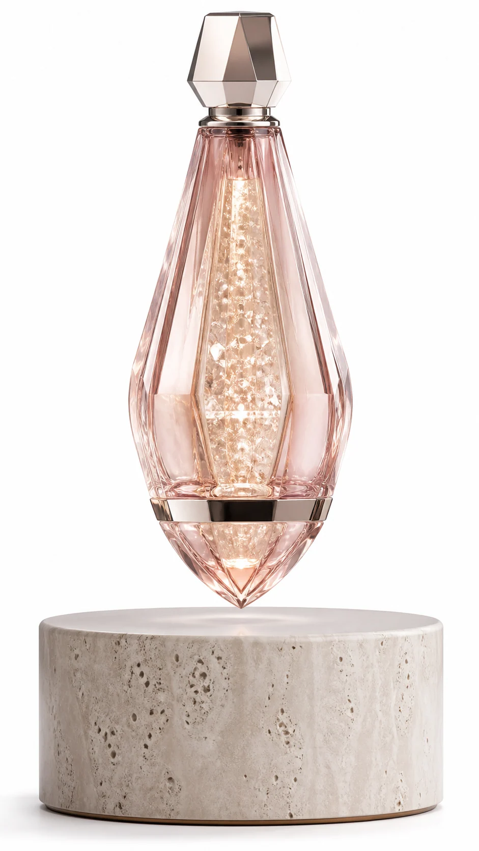AMO Prism Rose Lamp with a faceted rose crystal body and warm illuminated core above a light stone base